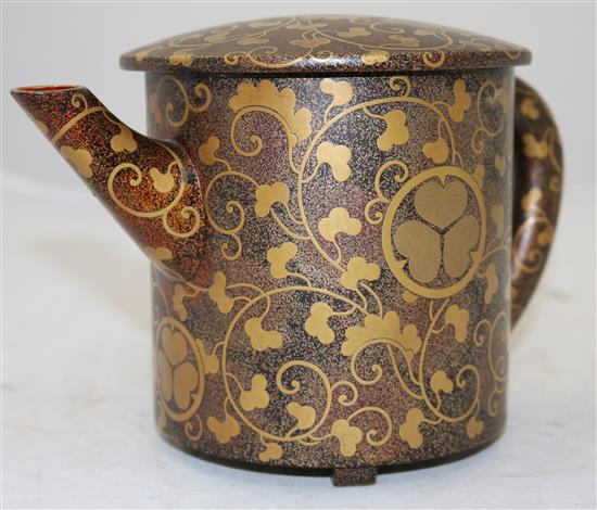 A Japanese togidashi lacquer wine pot and cover, 19th century, height 14cm